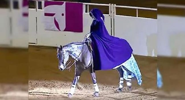 She Rides Up On A Horse- Then Removes Her Cape And Stuns Everyone