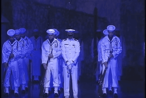 18 Sailors Stand Absolutely Still. Then, The Man In The Center Screams And They Move As One