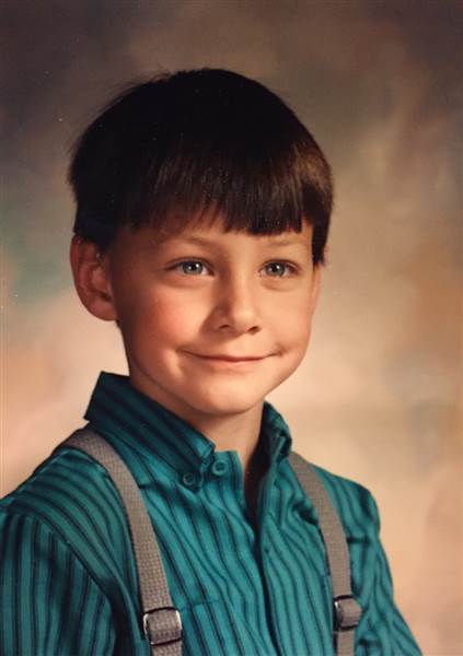 Kids Pose For A School Photo. 30 Years Later The Teacher Looks At The Bottom Left And Sees Everything