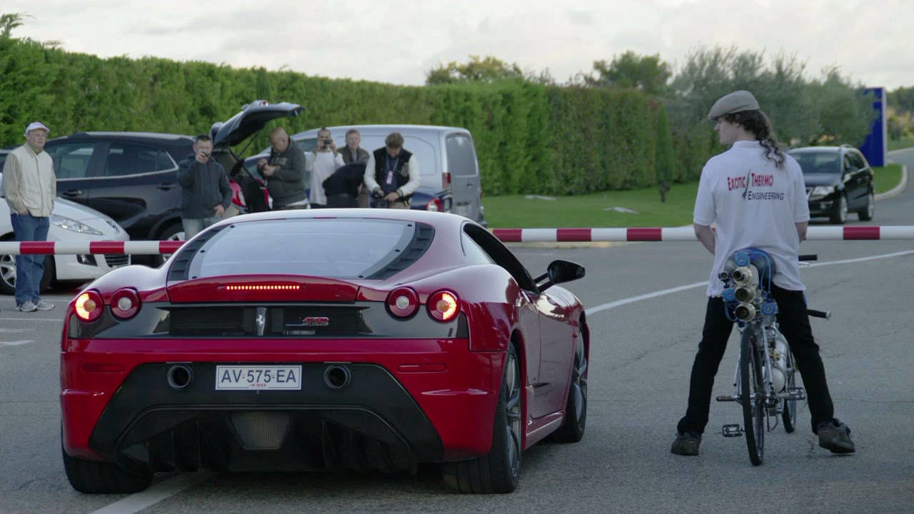 Have You Ever Seen A Bicycle Speeding At 207-mph Putting A Ferrari To Shame ? Watch THIS!!