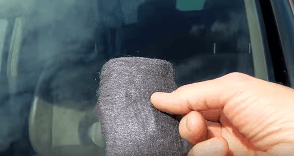 Guy Scrubs His Car Windscreen With Steel Wool. The Result Is Not What You Expect