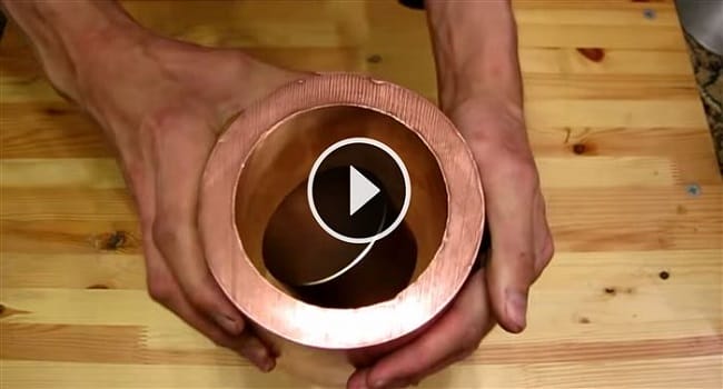 Watch What Happens When You Drop A Magnet Through A Copper Tube
