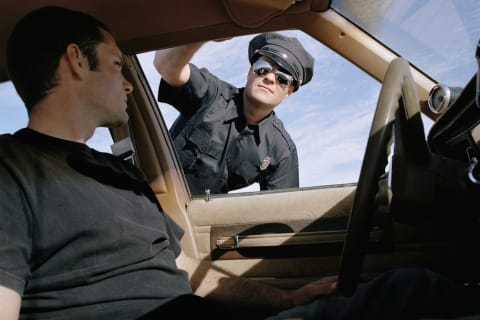 Ever Wondered Why Cops Touch Your Car's Tail Light After Pulling You Over?