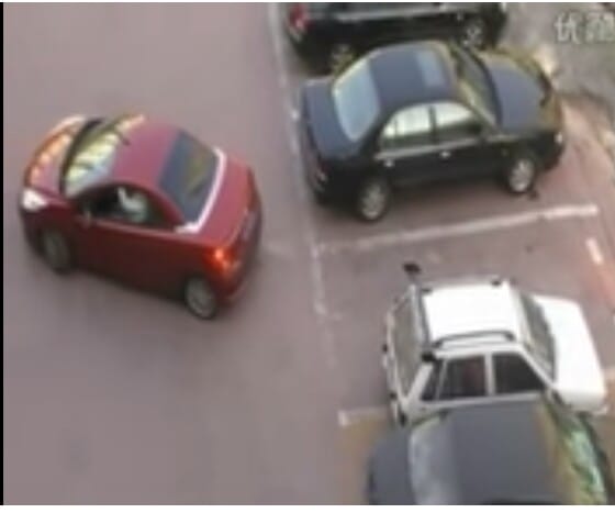 He speeds in to steal her spot, but she has the last laugh- BRILLIANT!