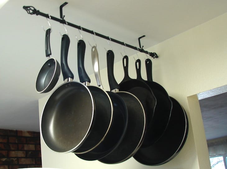 She Bought Some Tension Rods, But Didn't Use Them For Curtains. I Wish I'd Thought Of This Sooner