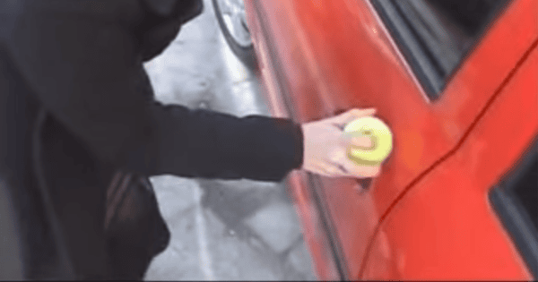 She Got Locked Out Of Her Car, So She Put A Tennis Ball Over The Keyhole. GENIUS!