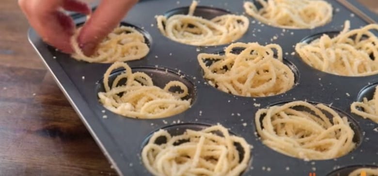 She Stuffs Spaghetti Into a Muffin Tin. What She Makes Will Impress All of Your Dinner. Guests